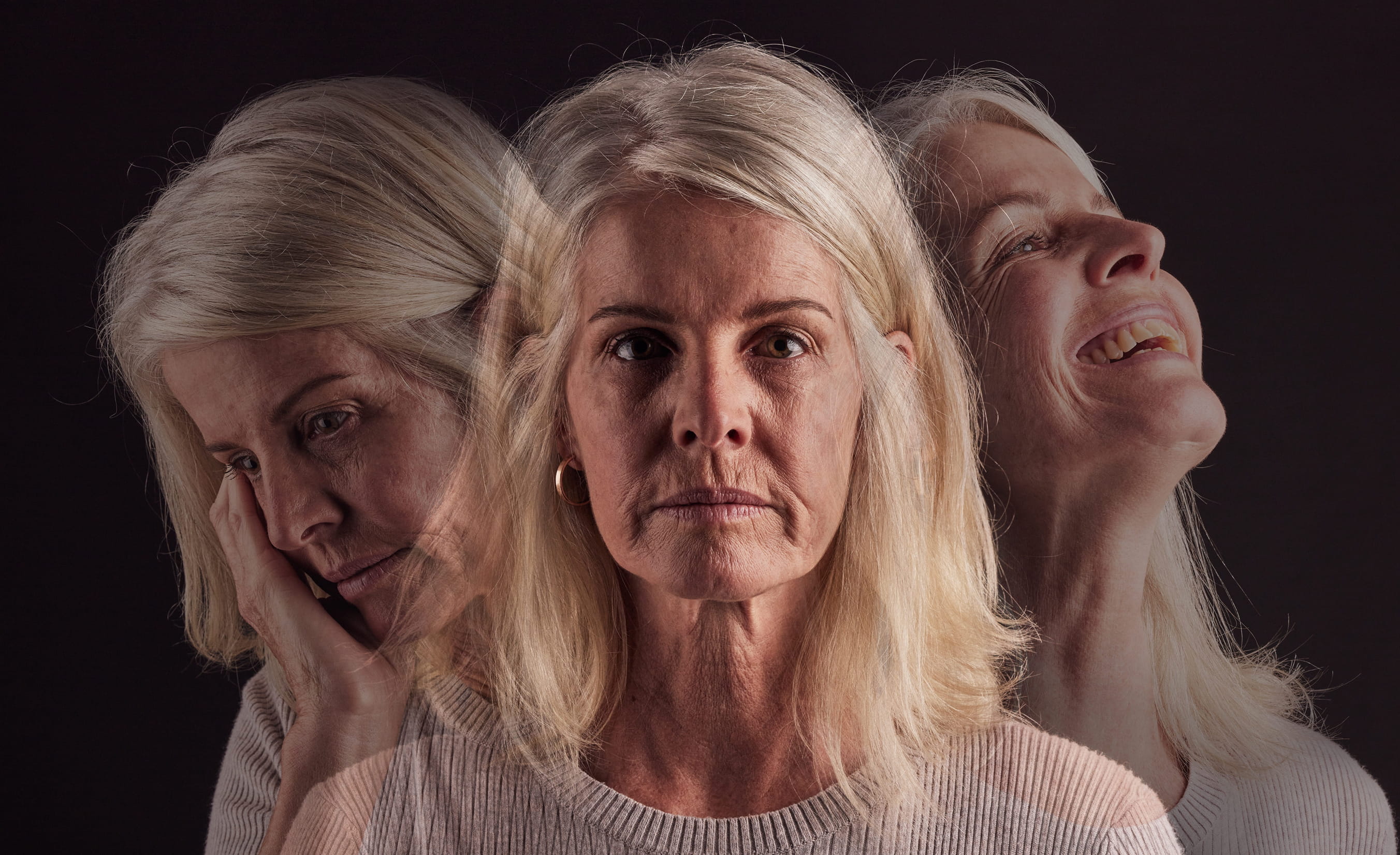 Triple exposure portrait of a woman depicting sadness, stoicism and distress, illustrating the mood swings, grief and emotional complexity that can surface during autumn and seasonal transitions — and the value of psychotherapy support